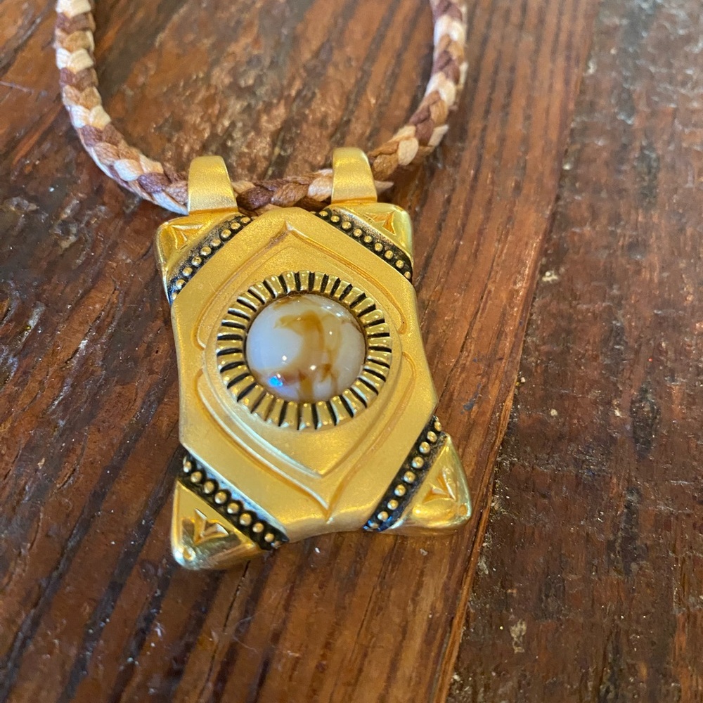 Gold and Brown Sunburst Necklace with Stone Accents